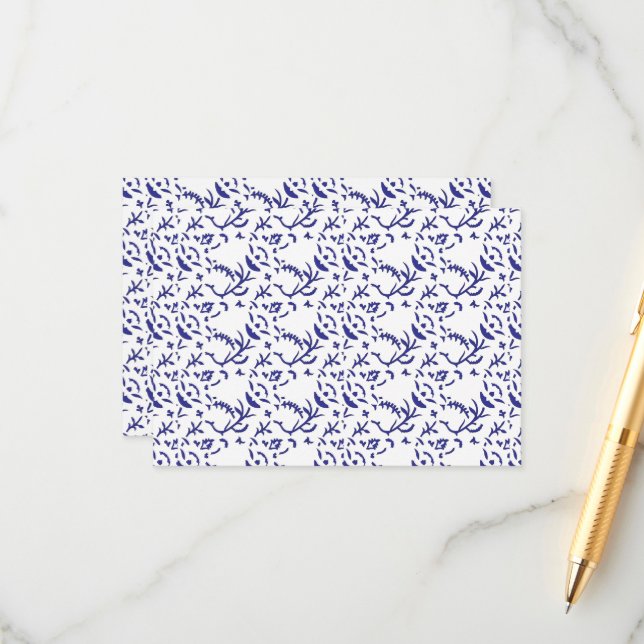 Blue and white wrapping paper featuring a graphic  enclosure card (Front/Back In Situ)