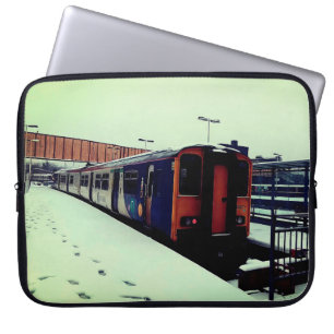 Blue and yellow train, in the snow laptop sleeve