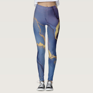 Blue background with gold streaks and dots leggings