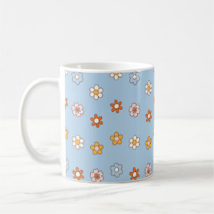 Blue background with mixed colour flowers coffee mug