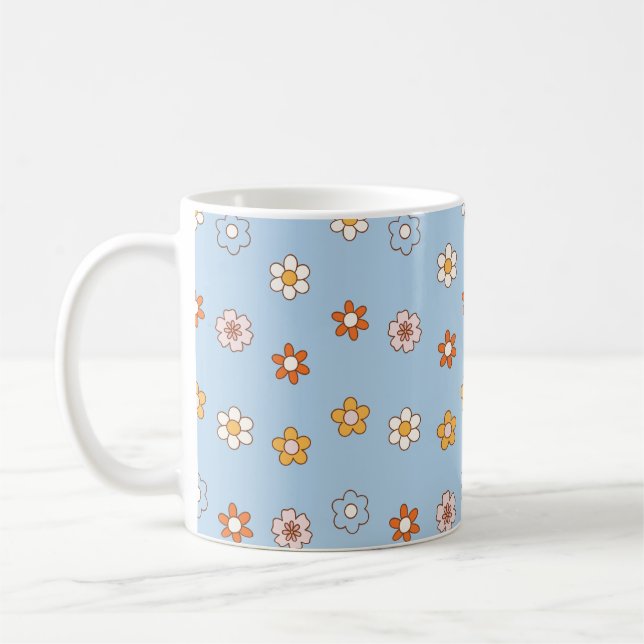 Blue background with mixed colour flowers coffee mug (Left)