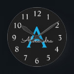Blue Black Script Girly Monogram Name Round Clock<br><div class="desc">Blue and Black Simple Script Monogram Name Clock. This makes the perfect sweet 16 birthday,  wedding,  bridal shower,  anniversary,  baby shower or bachelorette party gift for someone that loves glam luxury and chic styles.</div>