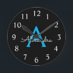 Blue Black Script Girly Monogram Name Round Clock<br><div class="desc">Blue and Black Simple Script Monogram Name Clock. This makes the perfect sweet 16 birthday,  wedding,  bridal shower,  anniversary,  baby shower or bachelorette party gift for someone that loves glam luxury and chic styles.</div>