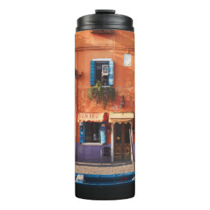 BLUE BOAT ON RIVER NEAR ORANGE BUILDING THERMAL TUMBLER
