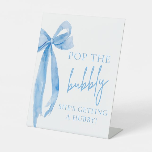 Blue Bow Pop The Bubbly She's Getting A Hubby Sign (Front)