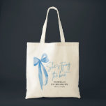Blue Bow She's Tying the Knot Bachelorette Party Tote Bag<br><div class="desc">Introducing the Blue Bow She's Tying the Knot Bachelorette Party Tote Bag – the perfect accessory for celebrating the bride-to-be! This chic tote bag features a stylish pink bow design with the phrase "She's Tying the Knot, " adding a touch of elegance to any bachelorette party. Made from durable, eco-friendly...</div>