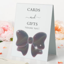 Blue bow white cards gifts sign