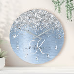 Blue Brushed Metal Silver Glitter Monogram Name Round Clock<br><div class="desc">Easily personalize this trendy chic round clock design featuring pretty silver sparkling glitter on a blue brushed metallic background.</div>