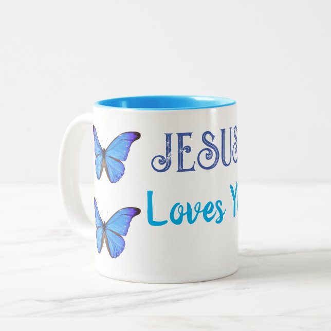 Blue butterflies Jesus loves you Two-Tone Coffee Mug (Front Left)