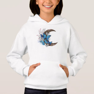 Blue butterflies on wooden crescent