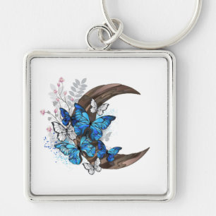 Blue butterflies on wooden crescent key ring