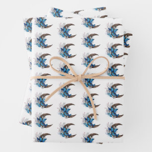 Blue butterflies on wooden crescent wrapping paper sheet