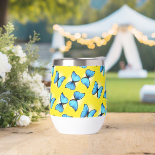 Blue butterflies pattern on yellow