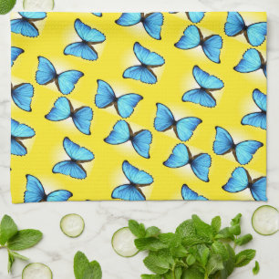 Blue butterflies pattern on yellow tea towel