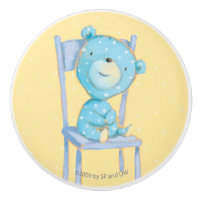 Blue Calico Bear Smiling on Chair