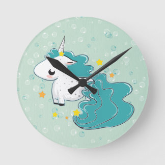 blue cartoon unicorn with stars clock