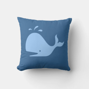 blue CARTOON whale  on medium blue pillow