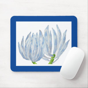 Blue Chalk Sticks on a Mouse Pad