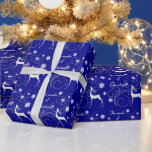 Blue Christmas Reindeer Wonder Wrapping Paper<br><div class="desc">This elegant holiday wrapping paper features a white silhouetted reindeer,  white snowflakes,  and a pretty silver swirl design on a dark blue night background. The text in white says "The Wonder of Christmas". Beautiful,  festive,  and unique!</div>