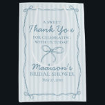 Blue Coquette Bow Pastel Bridal Shower Favour Medium Gift Bag<br><div class="desc">Add a touch of playful charm to your celebration with our Coquette Bow Party Decor Collection. Featuring a hand-drawn coquette bow doodle on a dreamy pastel striped background, this grandmillennial-inspired design is perfect for creating a soft, sweet party scene. The pastel blue palette and whimsical bow details bring a feminine...</div>