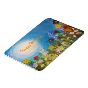 Blue cornflowers in a meadow of wildflowers magnet