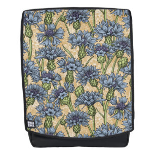 Blue cornflowers, wild flowers on honney yellow backpack