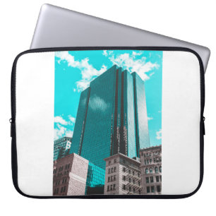 BLUE CURTAIN WALL BUILDING UNDER TEAL SKIES LAPTOP SLEEVE