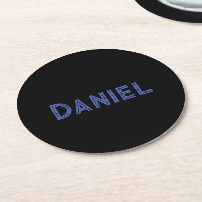 Blue custom name on black round paper coaster (Angled)