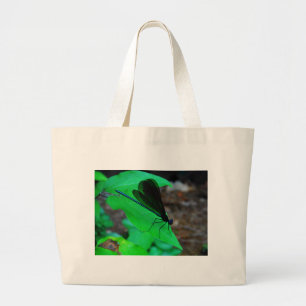Blue Damselfly on a green leaf. Large Tote Bag