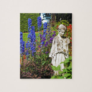 Blue delphinium flower garden and goddess statue jigsaw puzzle