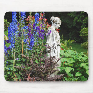 Blue delphinium flower garden and statue mouse mat