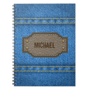 Blue denim jeans with leather name label notebook