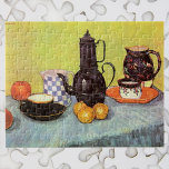 Blue Enamel Coffeepot by Vincent van Gogh Jigsaw Puzzle<br><div class="desc">Still Life: Blue Enamel Coffeepot, Earthenware and Fruit by Vincent van Gogh is a vintage fine art post impressionism still life painting featuring a coffee pot, tea cups, oranges and apples and other daily life household kitchen items. About the artist: Vincent Willem van Gogh was a Post Impressionist painter whose...</div>