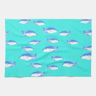 Blue fish on turquoise tea towel