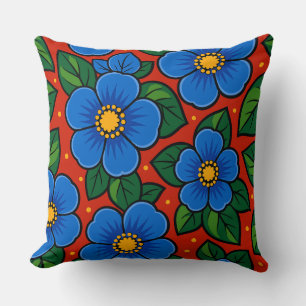 Blue Flowers and Green Leaves on a Red Background Cushion
