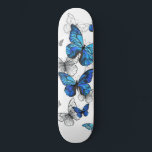 Blue Flying Butterflies Morpho Skateboard<br><div class="desc">Flying Blue Butterflies morpho and white butterflies on a light abstract background. Morpho. Design with blue butterflies morpho.</div>