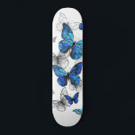Blue Flying Butterflies Morpho Skateboard<br><div class="desc">Flying Blue Butterflies morpho and white butterflies on a light abstract background. Morpho. Design with blue butterflies morpho.</div>
