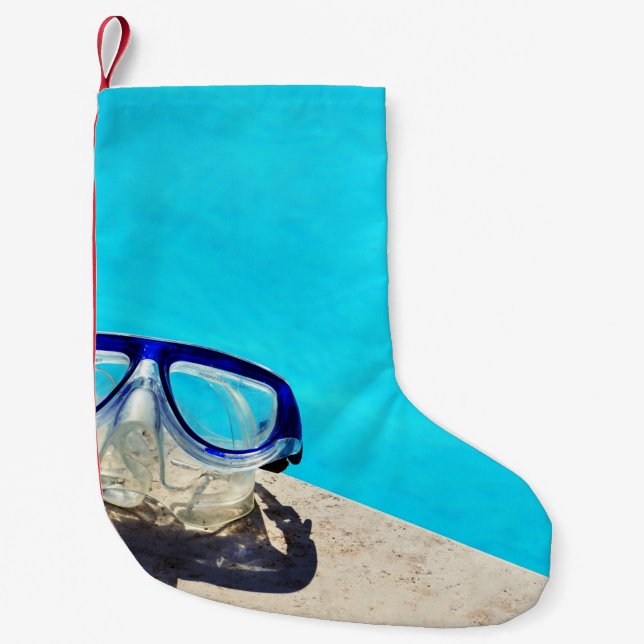Blue framed swimming goggles near pool at daytime small christmas stocking (Front)