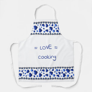 Blue glitter heart on white apron
