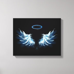 Blue Glowing Angel Wings on black background Canvas Print
