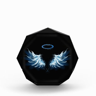 Blue Glowing Angel Wings on black background Photo Block