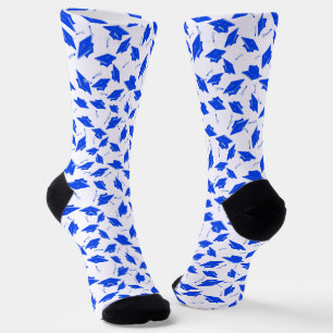 Blue Graduation Caps Tossed in the Air on White Socks