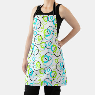blue green and black rings and circles on white  apron
