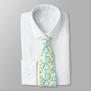 blue green and black rings and circles on white tie