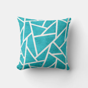 Blue-green and white mosaic pattern cushion