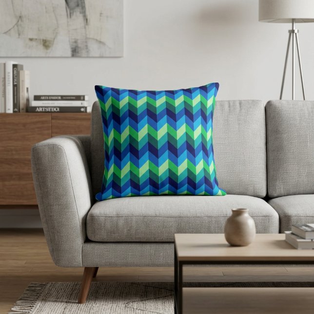 Blue Green Ombre Chevrons Throw Pillow (Blue Green Ombre Chevrons Throw Pillow on a sofa in a modern style living room.)