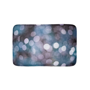 Blue grey bokeh, abstract background. bath mat