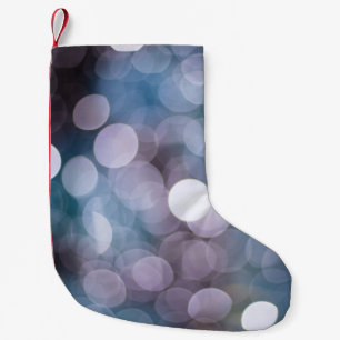 Blue grey bokeh, abstract background. small christmas stocking