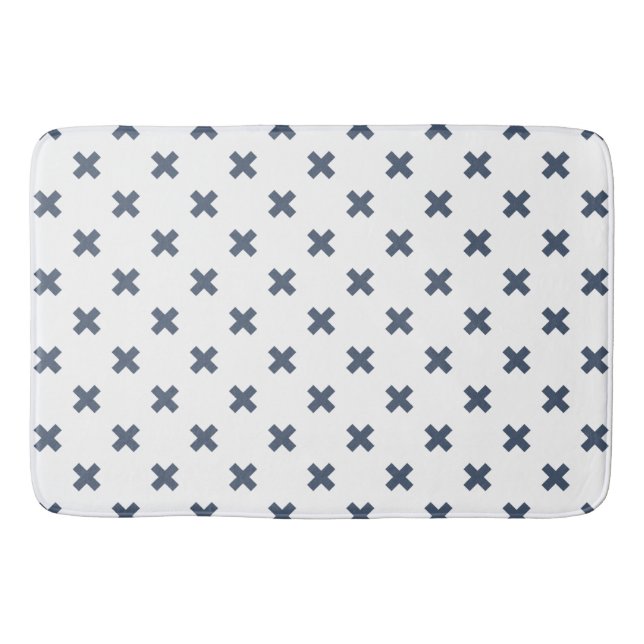 Blue-grey cross stitches on white bath mat (Front)