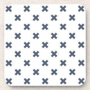 Blue-grey cross stitches on white coaster